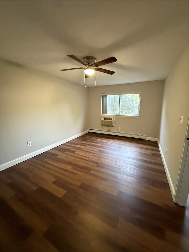 77 Adams Rd Unit 1D, Central Islip, NY 11722 - spare room featuring baseboard heating, dark wood-type flooring, ceiling fan, and a wall unit AC
