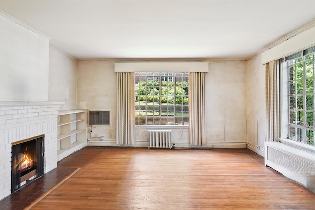 9 Bacon Ct, Bronxville, NY 10708 - unfurnished living room with radiator heating unit, crown molding, wood finished floors, and a brick fireplace