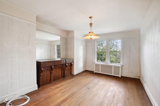 9 Bacon Ct, Bronxville, NY 10708 - unfurnished dining area featuring radiator and wood finished floors
