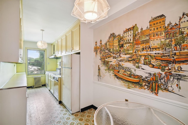9 Bacon Ct, Bronxville, NY 10708 - kitchen featuring freestanding refrigerator, radiator heating unit, decorative light fixtures, and light countertops