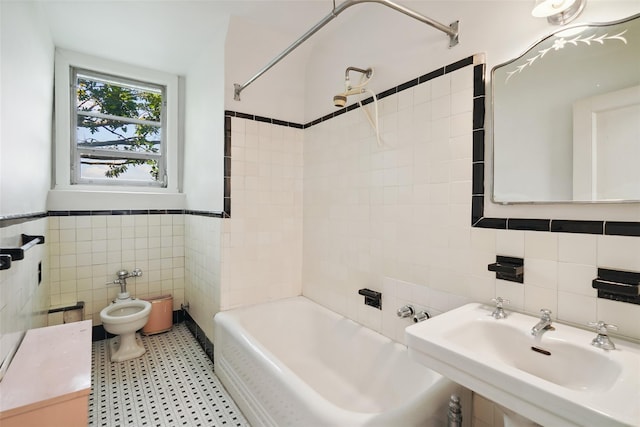9 Bacon Ct, Bronxville, NY 10708 - full bathroom featuring tile walls, shower / tub combination, a bidet, and wainscoting