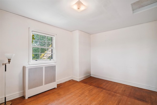 9 Bacon Ct, Bronxville, NY 10708 - spare room with radiator and light wood-type flooring