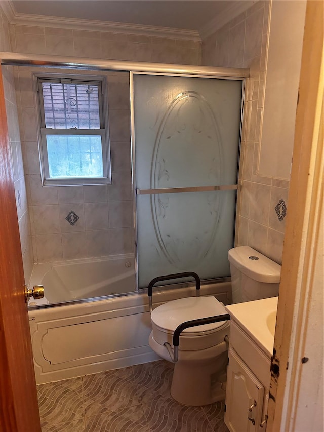 569 Warwick St, Brooklyn, NY 11207 - bathroom featuring vanity, crown molding, enclosed tub / shower combo, tile walls, and tile patterned floors