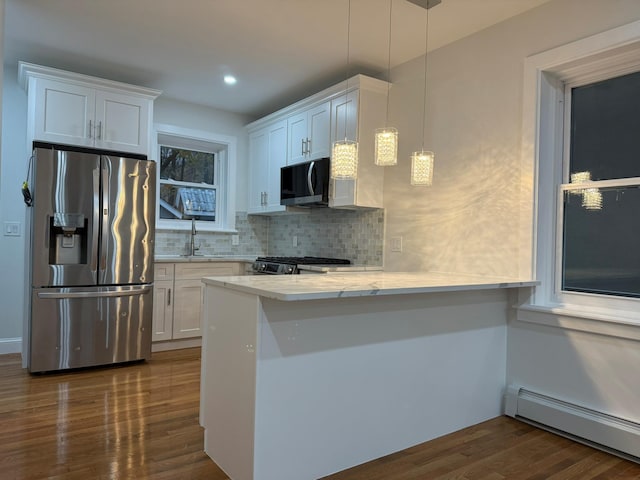 4223 Boyd Ave, Bronx, NY 10466 - kitchen with appliances with stainless steel finishes, baseboard heating, dark wood-type flooring, white cabinetry, and recessed lighting