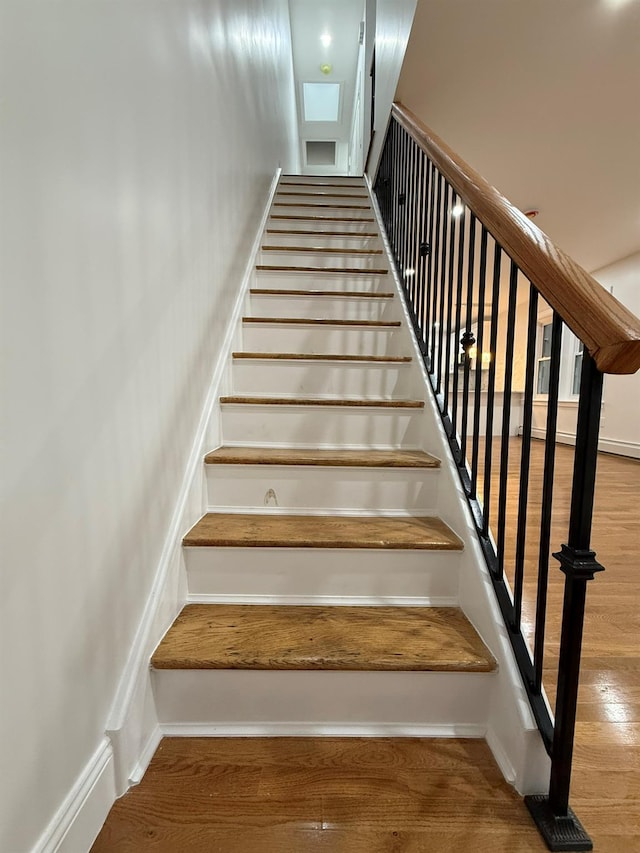 4223 Boyd Ave, Bronx, NY 10466 - staircase with wood finished floors and baseboards