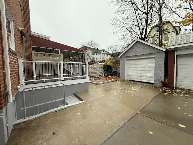 4223 Boyd Ave, Bronx, NY 10466 - view of home's exterior featuring brick siding, an outdoor structure, and driveway