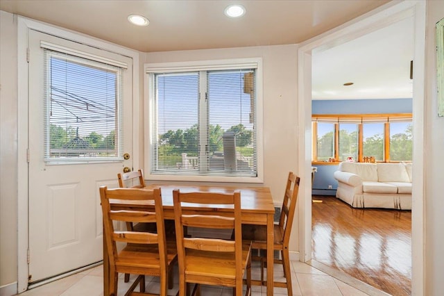 3478 Woodward St, Oceanside, NY 11572 - dining space with recessed lighting, a baseboard heating unit, and light tile patterned floors