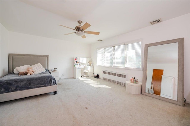 3478 Woodward St, Oceanside, NY 11572 - carpeted bedroom with radiator heating unit and ceiling fan