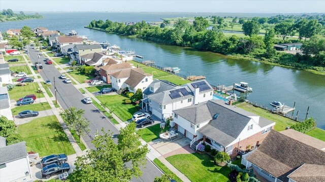 3478 Woodward St, Oceanside, NY 11572 - aerial perspective of suburban area featuring a nearby body of water