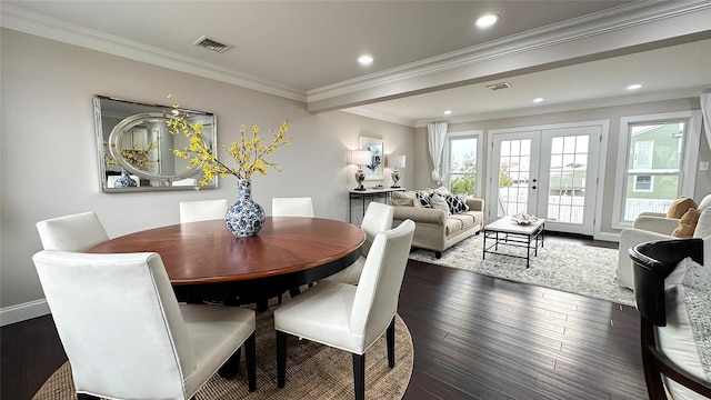 102 Surf Rd, Lindenhurst, NY 11757 - dining space featuring french doors, dark wood-type flooring, ornamental molding, and recessed lighting
