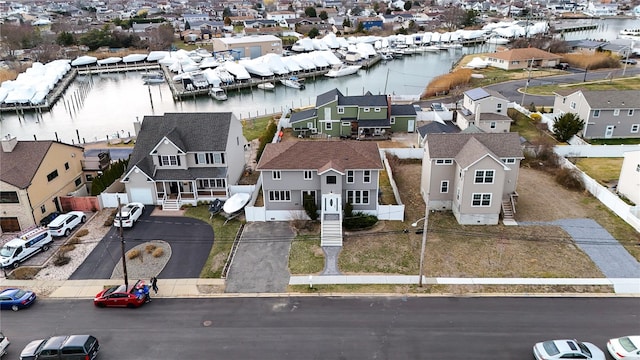 102 Surf Rd, Lindenhurst, NY 11757 - aerial perspective of suburban area featuring a nearby body of water