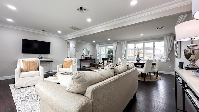 102 Surf Rd, Lindenhurst, NY 11757 - living room featuring dark wood-style floors, recessed lighting, and ornamental molding