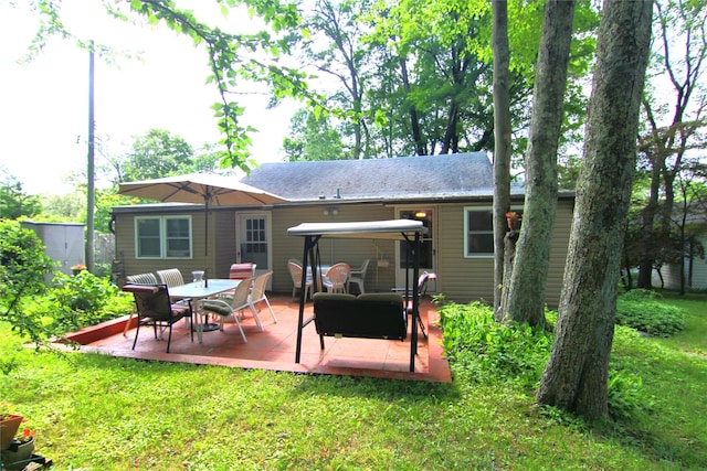 3155 Lexington Ave Unit 18Ab, Mohegan Lake, NY 10567 - back of property with a lawn and a patio