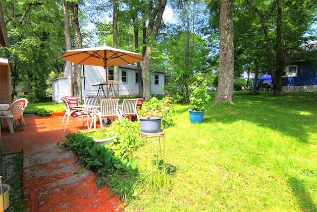 3155 Lexington Ave Unit 18Ab, Mohegan Lake, NY 10567 - view of grassy yard featuring a patio area
