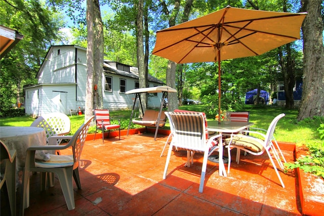 3155 Lexington Ave Unit 18Ab, Mohegan Lake, NY 10567 - view of patio / terrace with outdoor dining space and view of wooded area