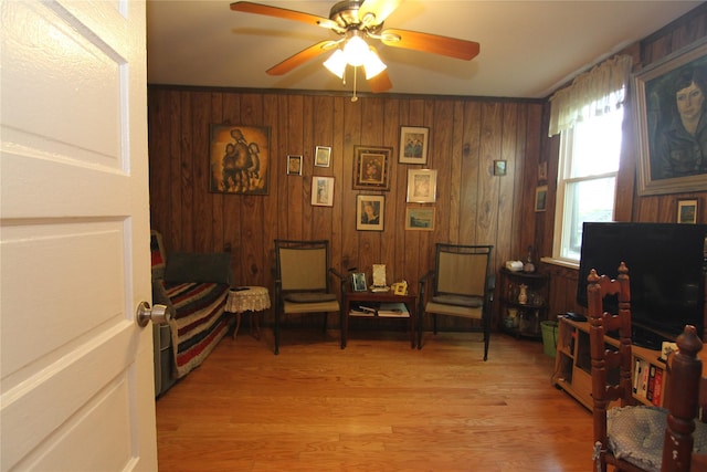 3155 Lexington Ave Unit 18Ab, Mohegan Lake, NY 10567 - sitting room featuring ceiling fan, light wood-style flooring, and wood walls