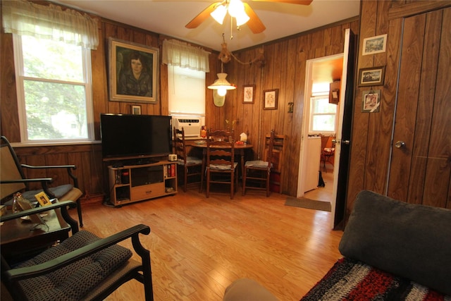 3155 Lexington Ave Unit 18Ab, Mohegan Lake, NY 10567 - living room featuring wooden walls, ceiling fan, and light wood finished floors