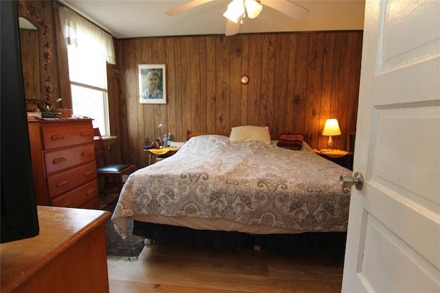3155 Lexington Ave Unit 18Ab, Mohegan Lake, NY 10567 - bedroom with wood finished floors, wooden walls, and a ceiling fan