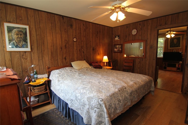 3155 Lexington Ave Unit 18Ab, Mohegan Lake, NY 10567 - bedroom featuring wood finished floors, wood walls, and a ceiling fan