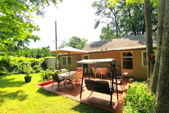 3155 Lexington Ave Unit 18Ab, Mohegan Lake, NY 10567 - rear view of property featuring a patio, a yard, a hot tub, and a shingled roof