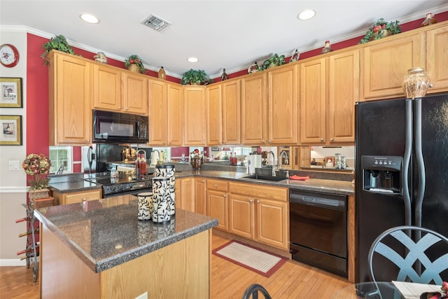 17 Meadow Pond Cir, Miller Place, NY 11764 - kitchen featuring black appliances, light wood-style floors, ornamental molding, recessed lighting, and light brown cabinetry