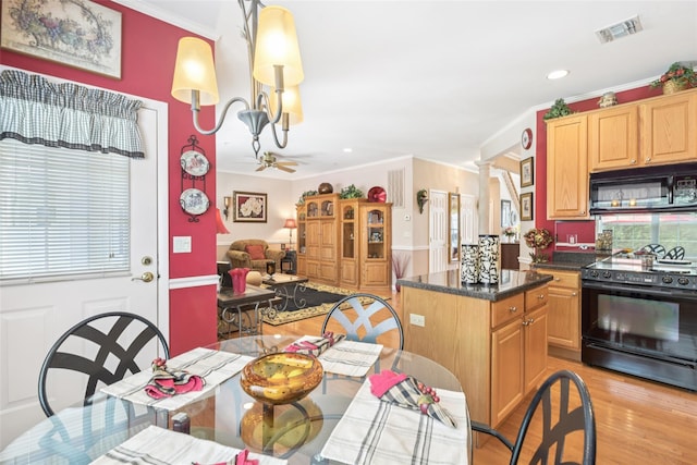 17 Meadow Pond Cir, Miller Place, NY 11764 - kitchen featuring black appliances, dark countertops, light wood finished floors, a ceiling fan, and ornamental molding