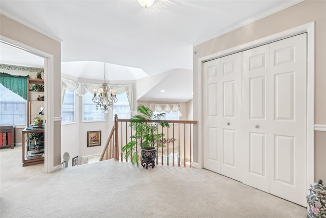 17 Meadow Pond Cir, Miller Place, NY 11764 - sitting room featuring an upstairs landing, carpet, a chandelier, and ornamental molding