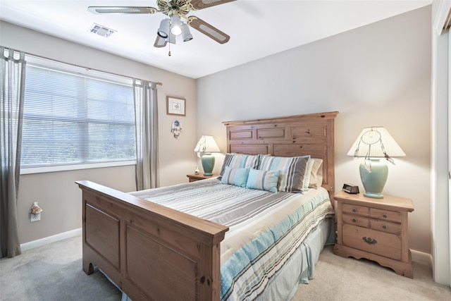 17 Meadow Pond Cir, Miller Place, NY 11764 - bedroom with light colored carpet and a ceiling fan