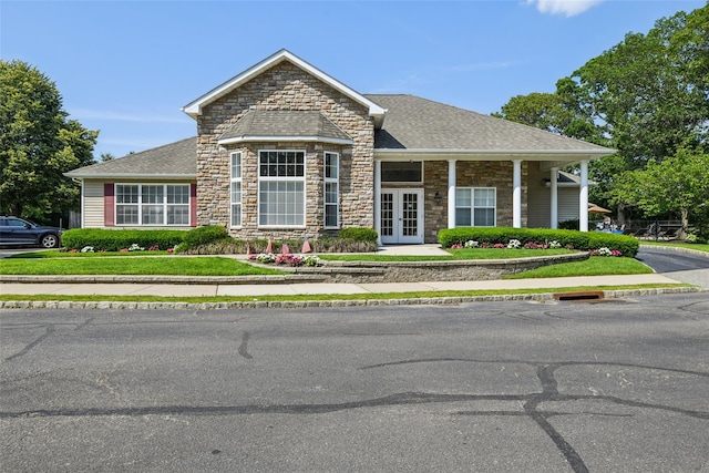 17 Meadow Pond Cir, Miller Place, NY 11764 - view of front of home with french doors, stone siding, and a shingled roof