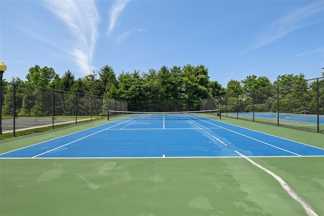 17 Meadow Pond Cir, Miller Place, NY 11764 - view of tennis court with community basketball court