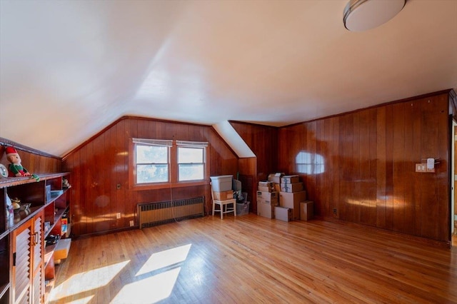 19611 Pompeii Ave, Hollis, NY 11423 - bonus room featuring radiator heating unit, lofted ceiling, wood walls, and wood finished floors