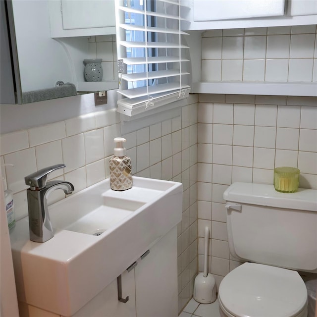 24 Pine St, Oceanside, NY 11572 - bathroom with tile walls, decorative backsplash, and vanity