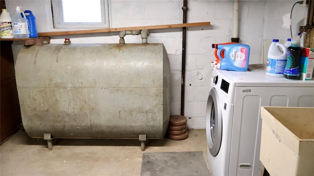 24 Pine St, Oceanside, NY 11572 - washroom with oil tank and washer and dryer