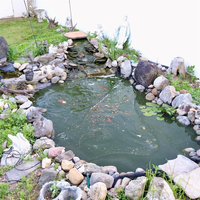 24 Pine St, Oceanside, NY 11572 - exterior view of a small pond