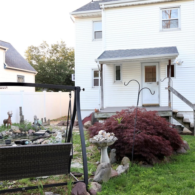 24 Pine St, Oceanside, NY 11572 - back of property with roof with shingles