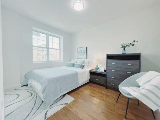 141-15 Cherry Ave Unit 2E, Flushing, NY 11355 - bedroom featuring wood finished floors