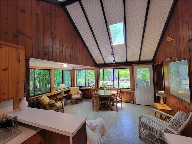 3300 Baker St Unit 16, Mohegan Lake, NY 10547 - sunroom with wood walls, high vaulted ceiling, and beam ceiling