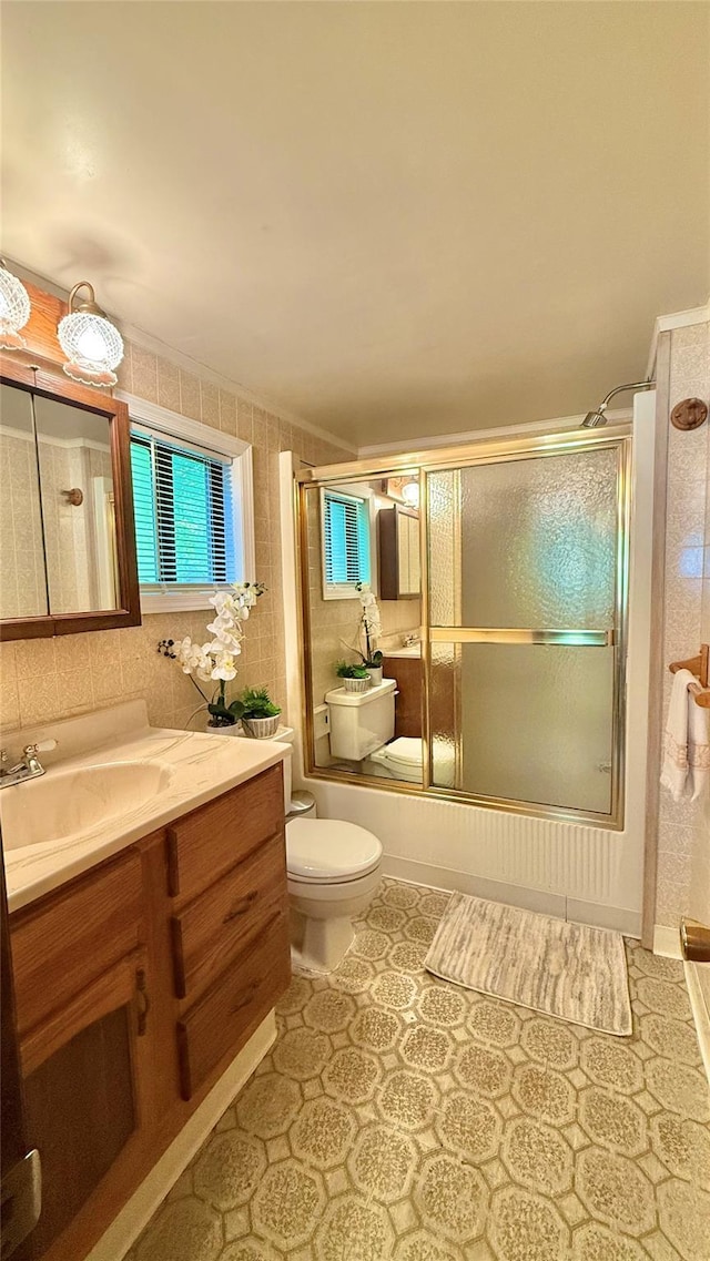 3300 Baker St Unit 16, Mohegan Lake, NY 10547 - bathroom with vanity and combined bath / shower with glass door