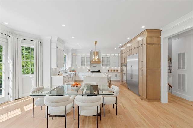 17 Chelsea Pl, Dix Hills, NY 11746 - dining area with light wood finished floors and recessed lighting