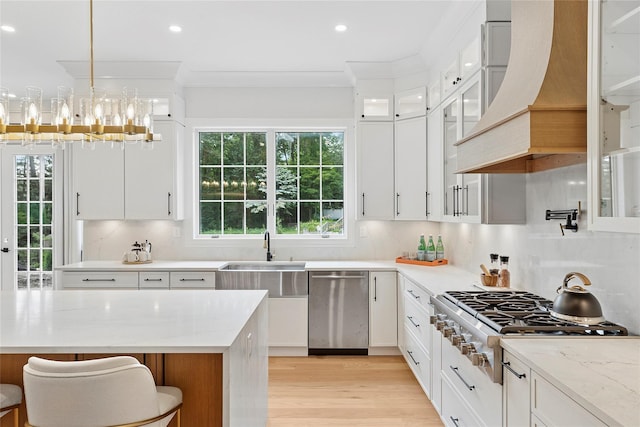 17 Chelsea Pl, Dix Hills, NY 11746 - kitchen featuring stainless steel appliances, custom exhaust hood, decorative backsplash, white cabinetry, and ornamental molding