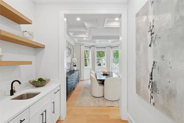 17 Chelsea Pl, Dix Hills, NY 11746 - dining space featuring light wood-style floors, coffered ceiling, crown molding, beamed ceiling, and recessed lighting