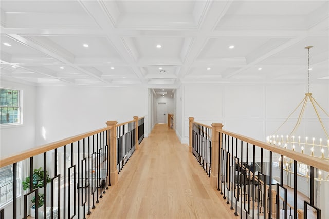 17 Chelsea Pl, Dix Hills, NY 11746 - corridor with an upstairs landing, recessed lighting, light wood finished floors, a chandelier, and beam ceiling