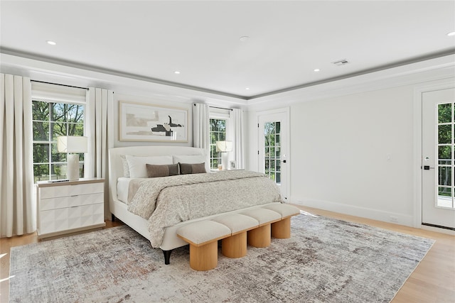 17 Chelsea Pl, Dix Hills, NY 11746 - bedroom featuring access to exterior, light wood-style floors, and recessed lighting