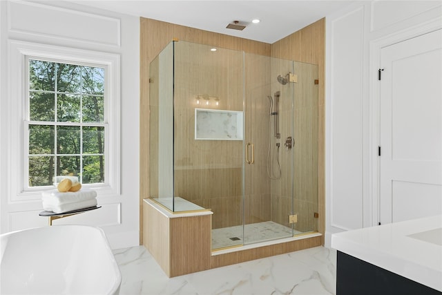 17 Chelsea Pl, Dix Hills, NY 11746 - bathroom featuring a soaking tub, a shower stall, marble finish flooring, and vanity