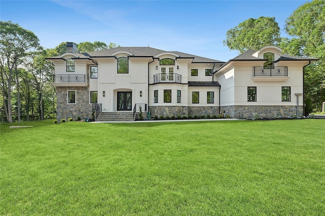 17 Chelsea Pl, Dix Hills, NY 11746 - french country inspired facade featuring a balcony, french doors, and stone siding