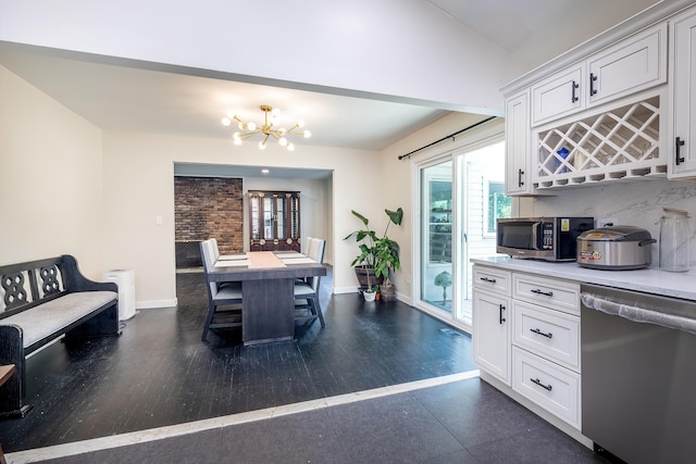 29 Meadow Ln, Chappaqua, NY 10514 - dining area with a chandelier and baseboards