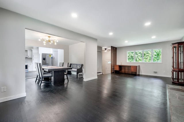 29 Meadow Ln, Chappaqua, NY 10514 - dining area featuring a chandelier, recessed lighting, dark wood-type flooring, and a baseboard radiator