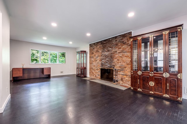 29 Meadow Ln, Chappaqua, NY 10514 - unfurnished living room featuring wood finished floors, a brick fireplace, and recessed lighting
