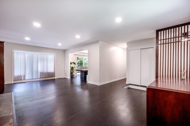 29 Meadow Ln, Chappaqua, NY 10514 - unfurnished living room featuring dark wood-style flooring and recessed lighting