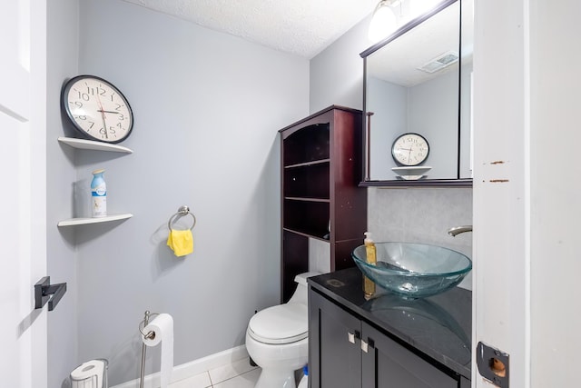 29 Meadow Ln, Chappaqua, NY 10514 - half bathroom featuring tile patterned flooring, vanity, and a textured ceiling
